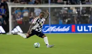 Real Salt Lake player taking a powerful shot during match against St. Louis City SC
