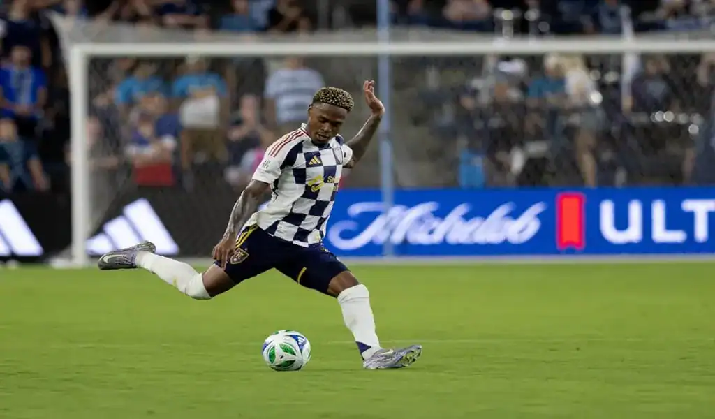 Real Salt Lake player taking a powerful shot during match against St. Louis City SC