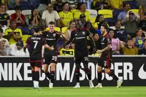 They are likely participating in a soccer match, possibly during a tournament or championship event.