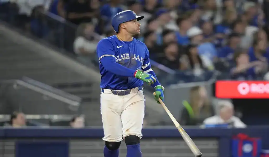 Toronto Blue Jays batter watches hit during MLB matchup against Los Angeles Angels on July 4th 2025