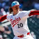 Minnesota Twins pitcher delivering a pitch during game against Chicago Cubs