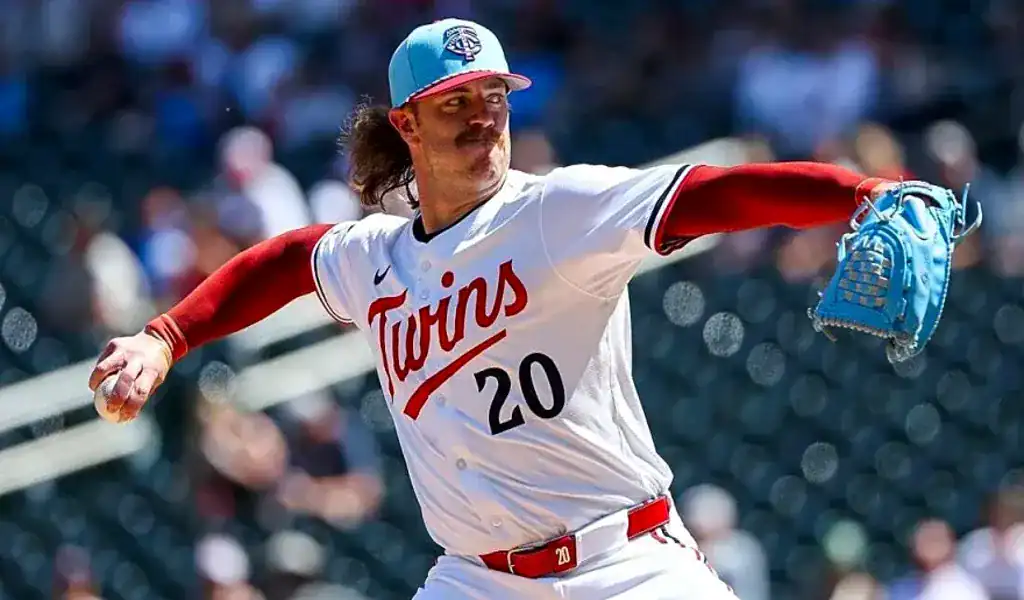 Minnesota Twins pitcher delivering a pitch during game against Chicago Cubs