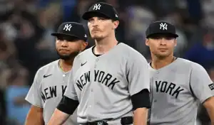 New York Yankees players walk off the field during game against Tampa Bay Rays on July 29, 2025.
