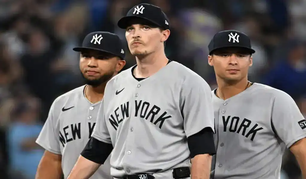 New York Yankees players walk off the field during game against Tampa Bay Rays on July 29, 2025.