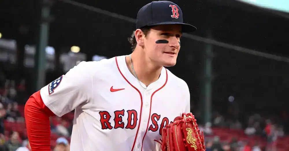 Washington Nationals vs Boston Red Sox Picks and Predictions July 6th 2025 2 A man is dressed in a baseball uniform and is holding a mitt. He appears to be positioned on a baseball field