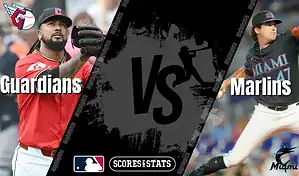 Cleveland Guardians pitcher prepares to throw against Miami Marlins in MLB matchup on August 14, 2025.