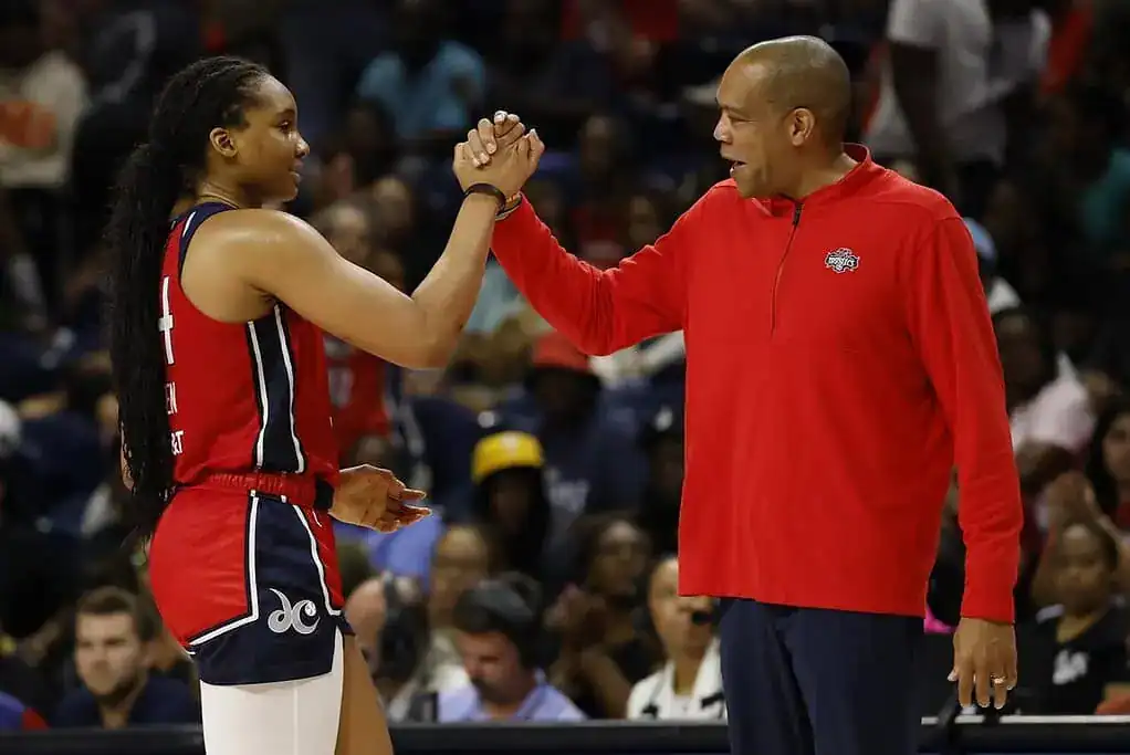 MYSTICS COACH AND PLAYER