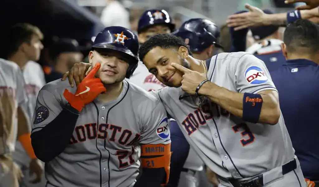 Houston Astros players celebrate in the dugout before matchup with Miami Marlins on August 6, 2025