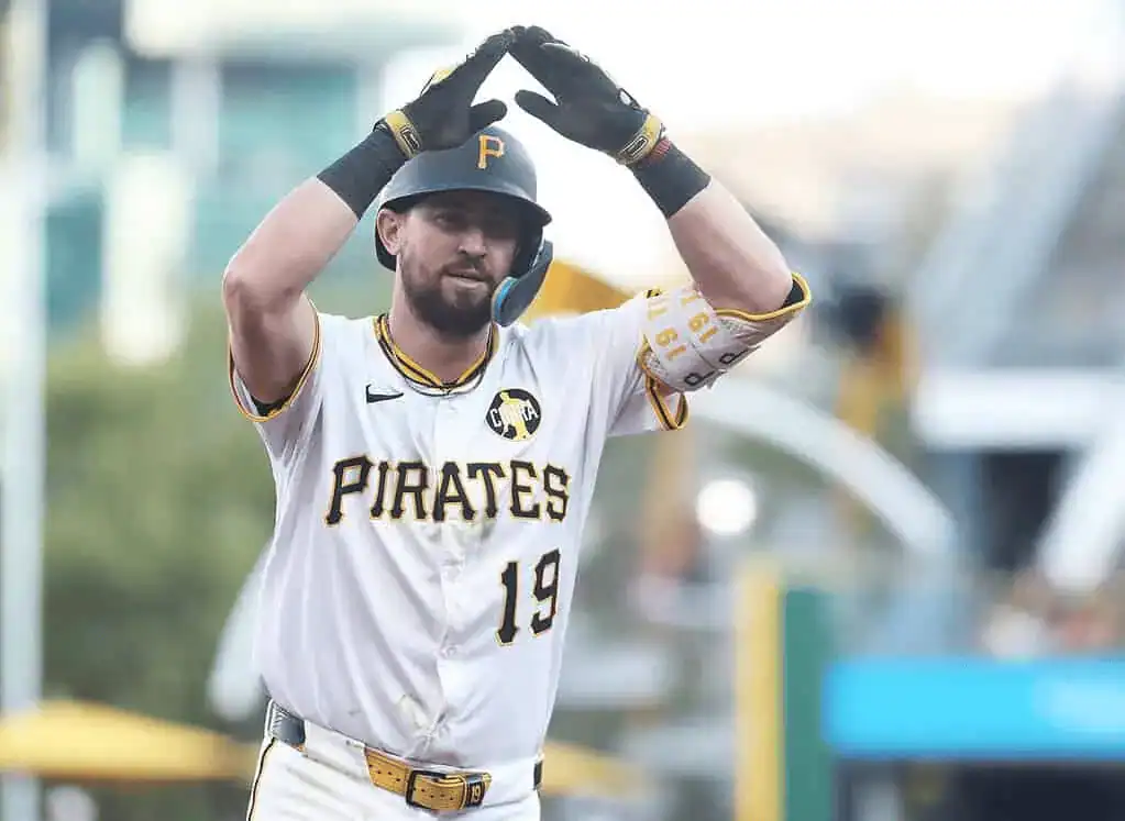 Pittsburgh Pirates player with jersey number 19 making a celebratory gesture after a play.