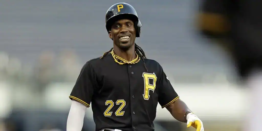 Colorado Rockies vs Pittsburgh Pirates Picks and Predictions August 2nd 2025 2 A baseball player in a black Pittsburgh Pirates uniform walks confidently on the field, wearing a helmet and preparing for the game.