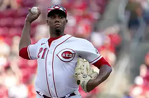 Cincinnati Reds pitcher throwing a pitch