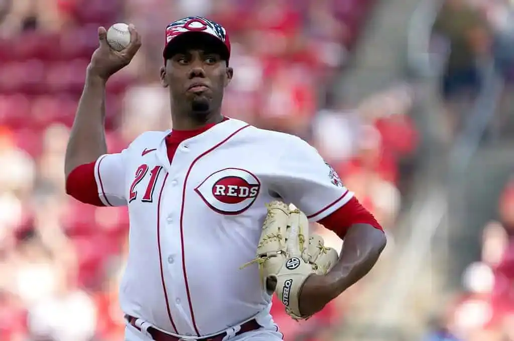 Cincinnati Reds pitcher throwing a pitch