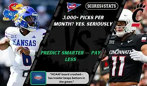 Kansas Jayhawks quarterback and Cincinnati Bearcats defender face off in NCAA football game, September 27, 2025.