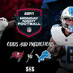 Tampa Bay running back in white jersey carrying the ball on the left, Detroit running back in blue and white uniform on the right, MNF graphic in the center.
