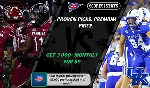 South Carolina Gamecocks players celebrate in red uniforms while Kentucky Wildcats line up in blue during a college football matchup.