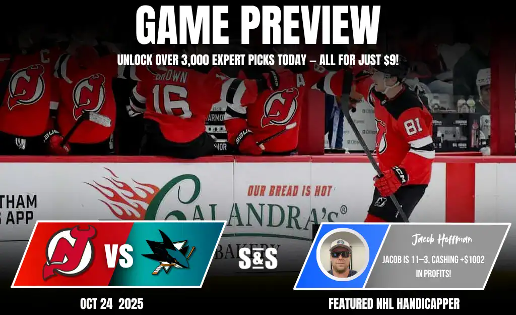 A hockey team in red jerseys celebrates on the bench during a game preview for the Devils vs. Sharks on October 24, 2025.
