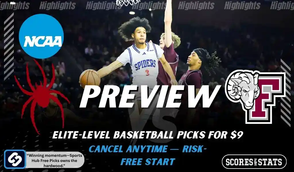 Previews 8 Richmond Spiders guard drives to the basket against Fordham Rams defenders during an NCAA mens basketball game